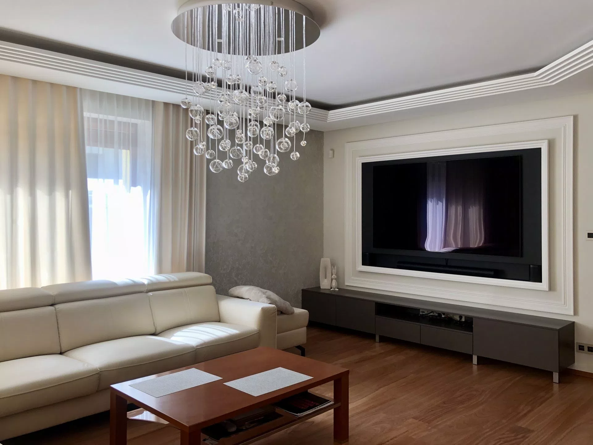 Circular shape fibre optic chandelier in modern livingroom