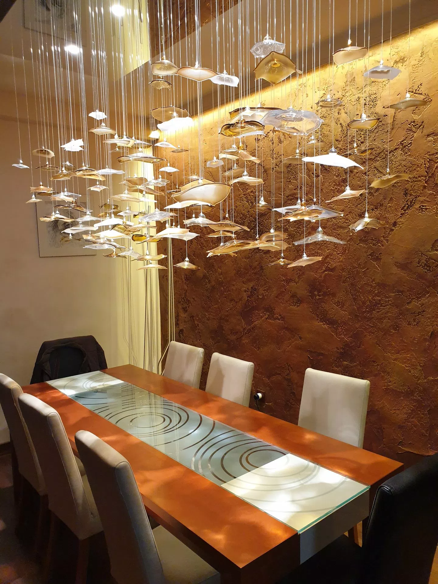 Fibre optic chandelier Infinito with organis chape hand blown golden glass parts