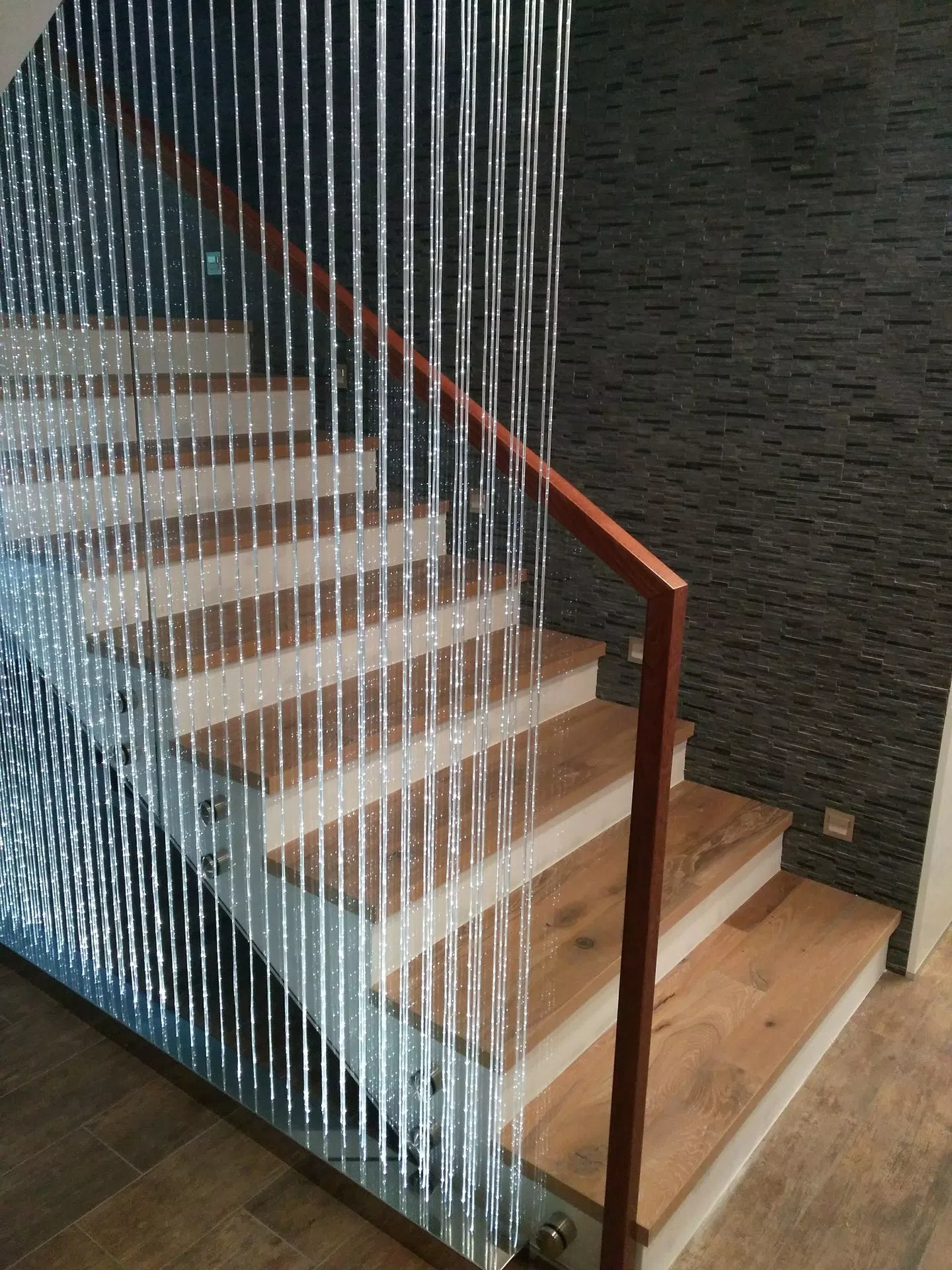 Any staircase with gap inside between rails can be fit with this unique mood lighting chandelier