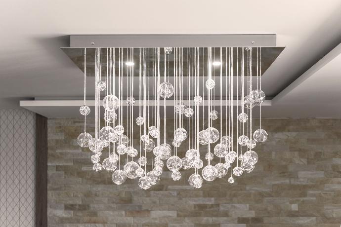 Main power downlights on AQUILA fiber optic chandelier