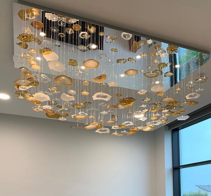 Luxury organic shape glass fibre optic chandelier in seaside villa