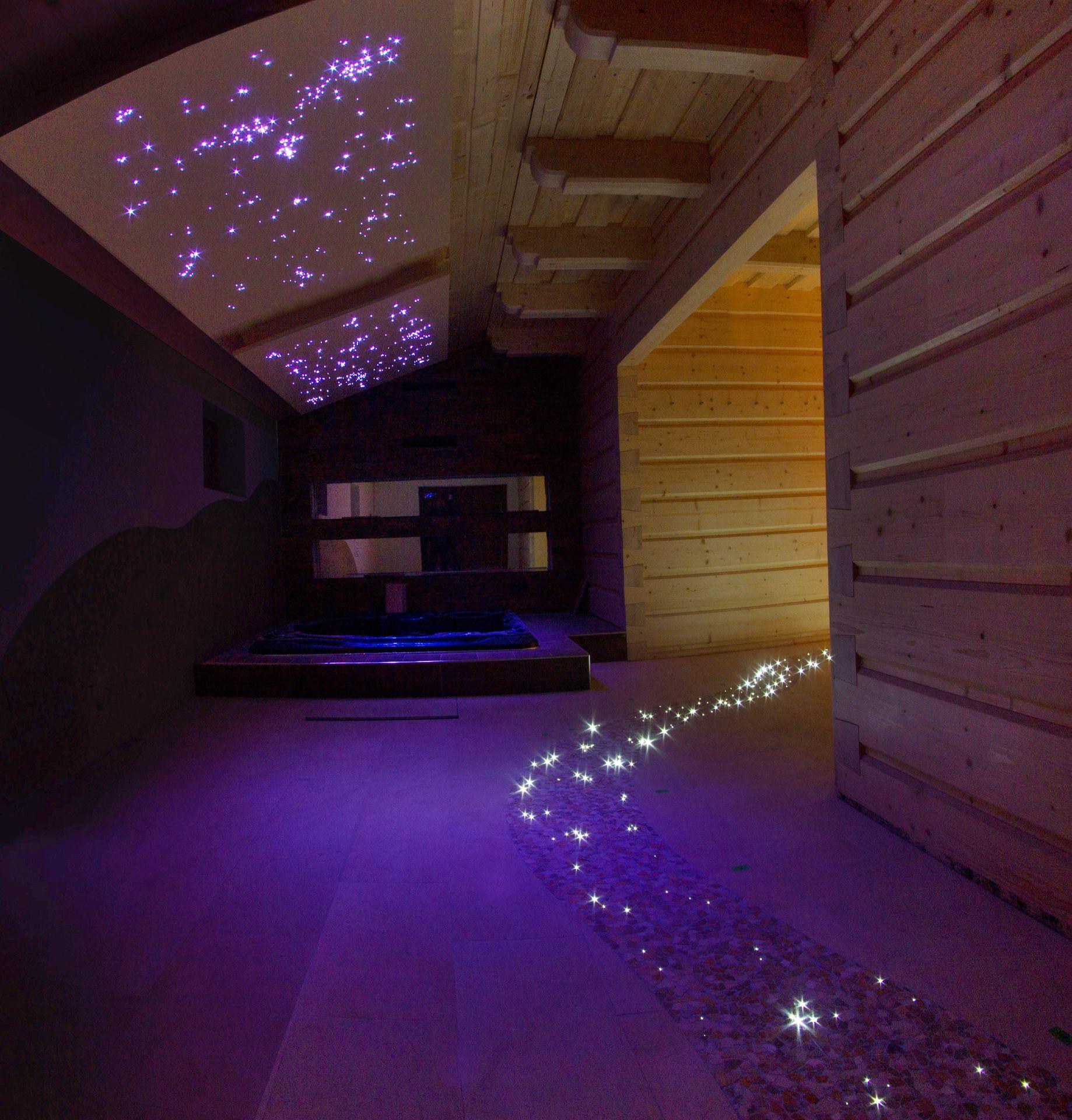 Private wellness starry sky fiber efect lighting above whirlpool in spa 