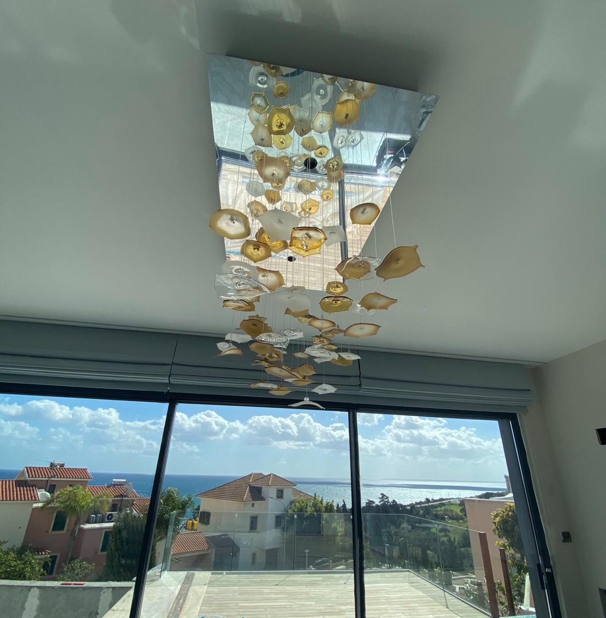 Fibre optic chandelier daytime with sea view