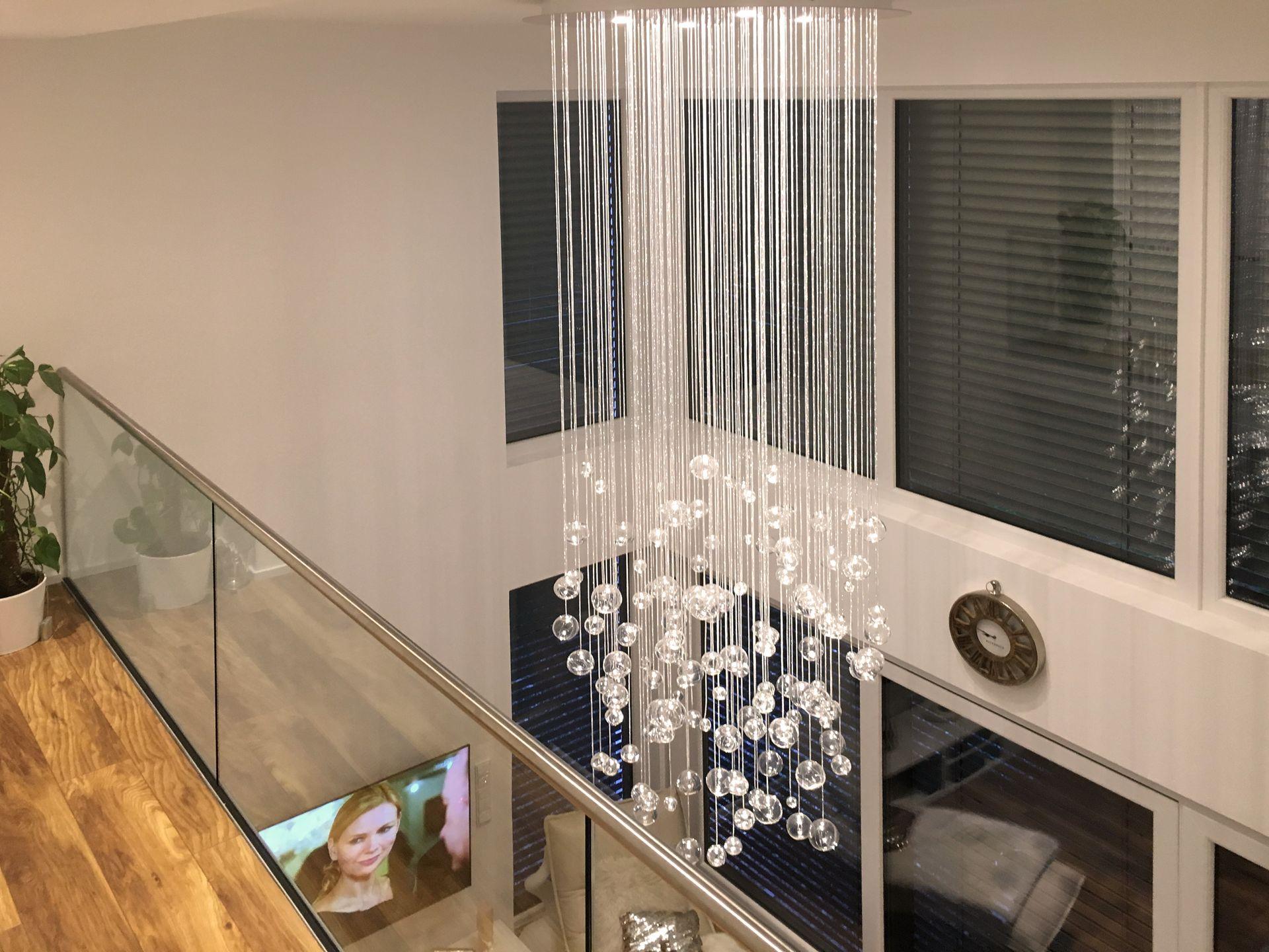 panoramatic view from second stroey of private house on livingroom chandelier AQUILA