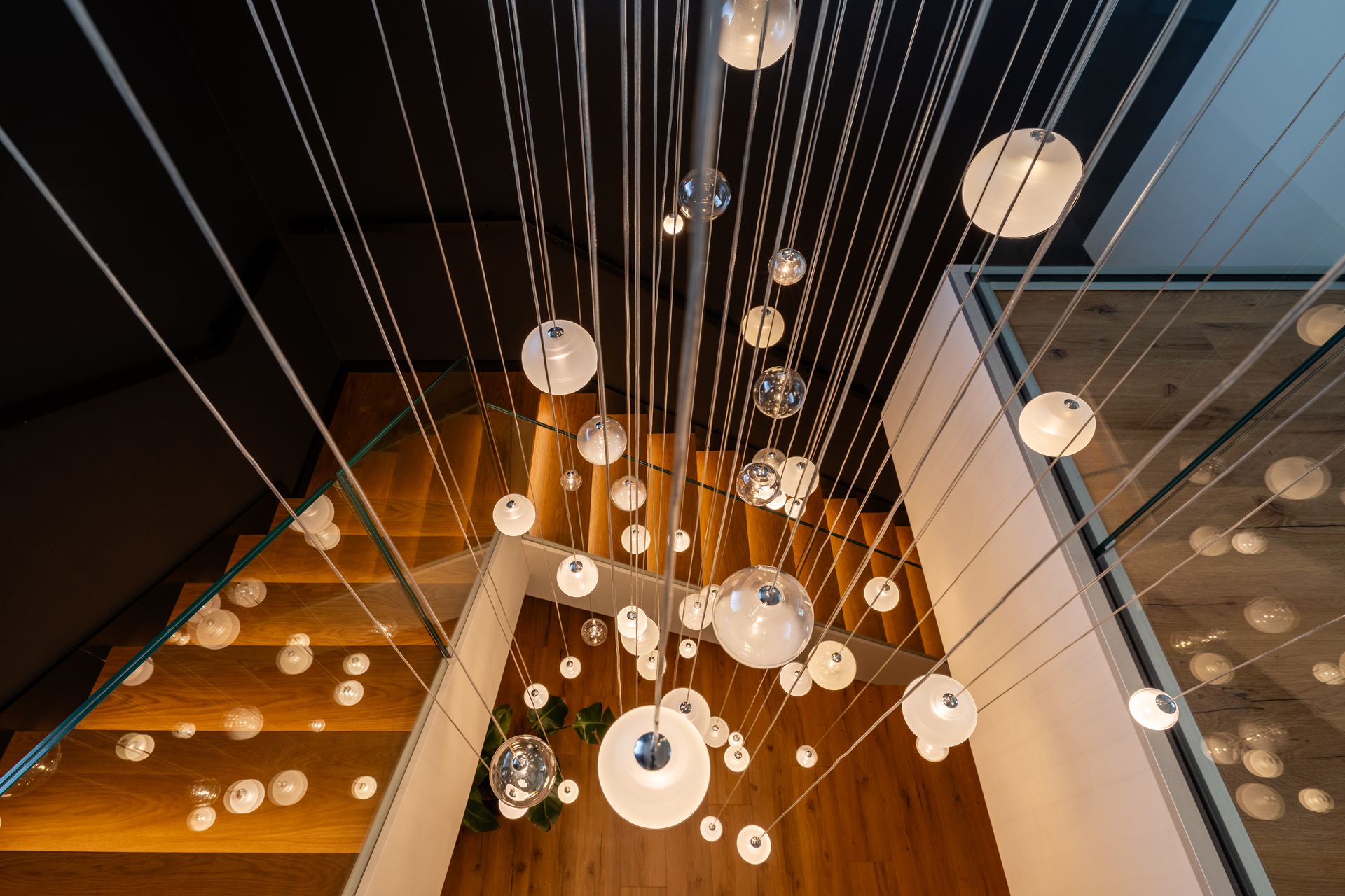 Chandelier detail viewed from top on staircase