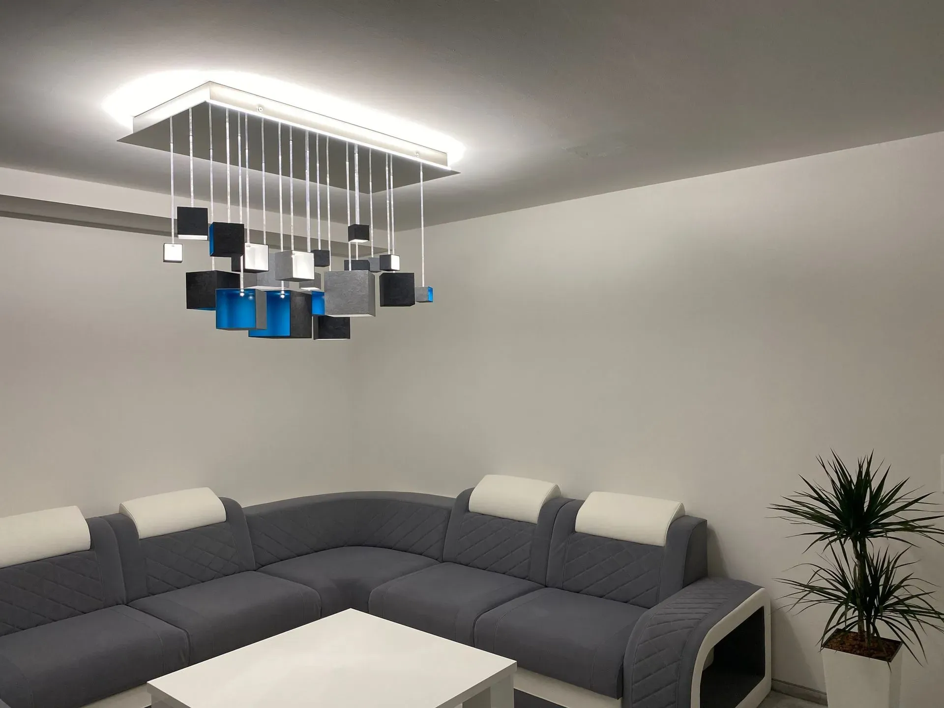 Blue GRAIN chandelier for modern interior with minimalistic concrete design made of fibre optic livingroom sofa