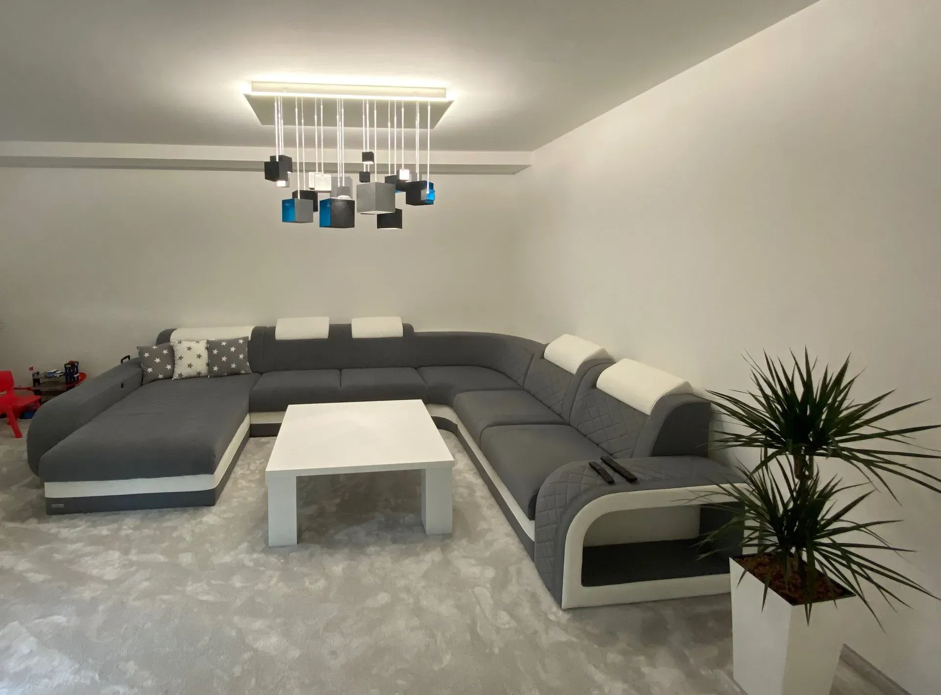 Blue GRAIN chandelier for modern interior with minimalistic concrete design made of fibre optic livingroom sofa