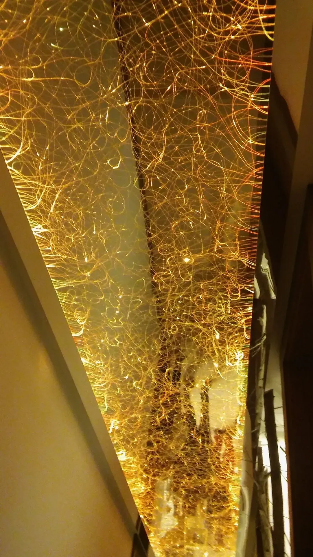 Fibre optic gold chandelier hallway private house